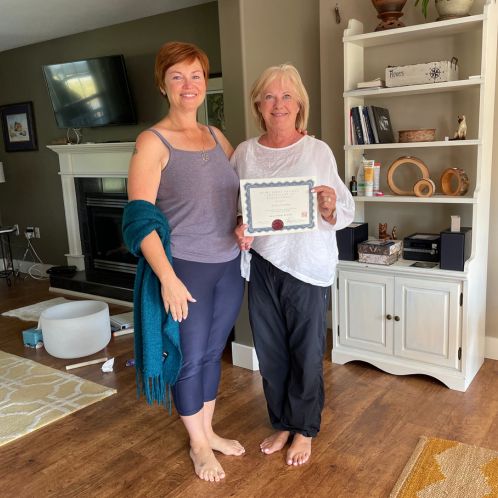 Anita receives her Reiki certificate