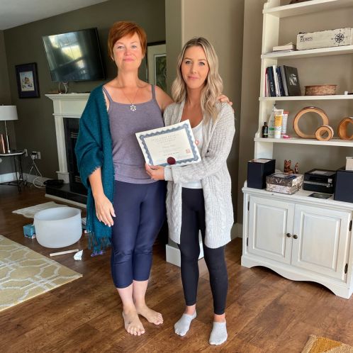 Whitney receives Reiki training certificate